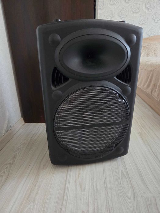 Караоке колона с 2 микрофона, Bluetooth, USB, FM, акумулаторна батерия