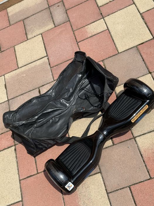 Hoverboard negru cu telecomandă – Distracție garantată la preț mic!