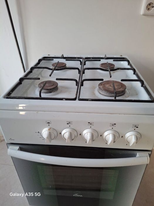 Плита с духовкой 25000