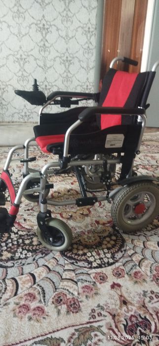 Электрическая инвалидная коляска