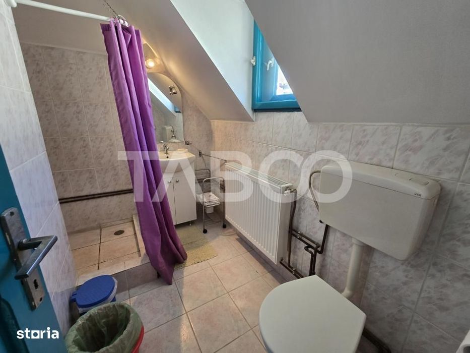 Casa spatioasa de vanzare teren 432 mp zona linistita - Lupeni Sibiu