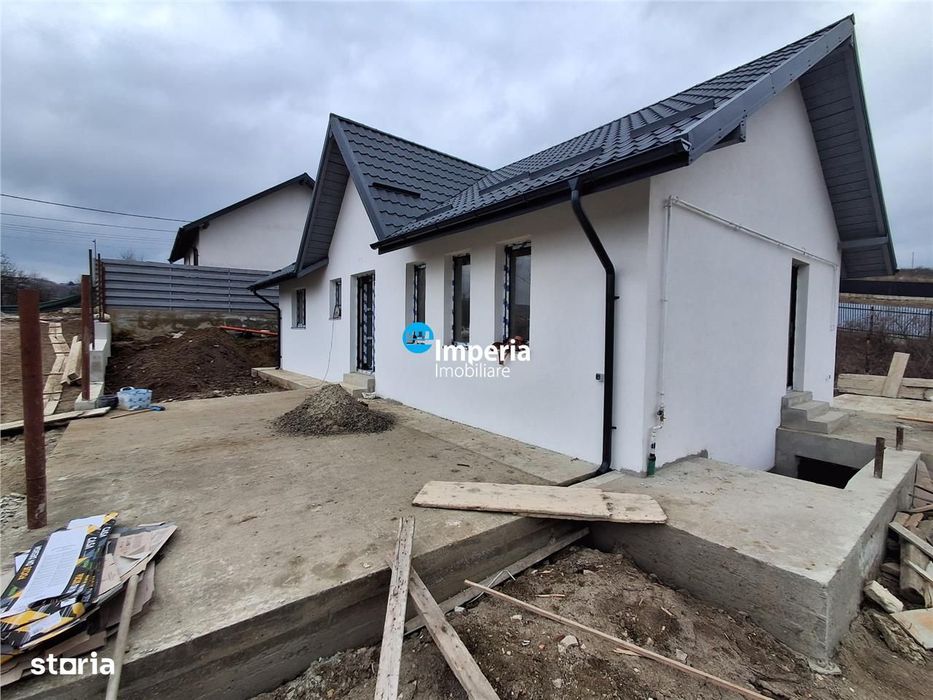 Casa plan parter de vanzare in zona Bucium Visan