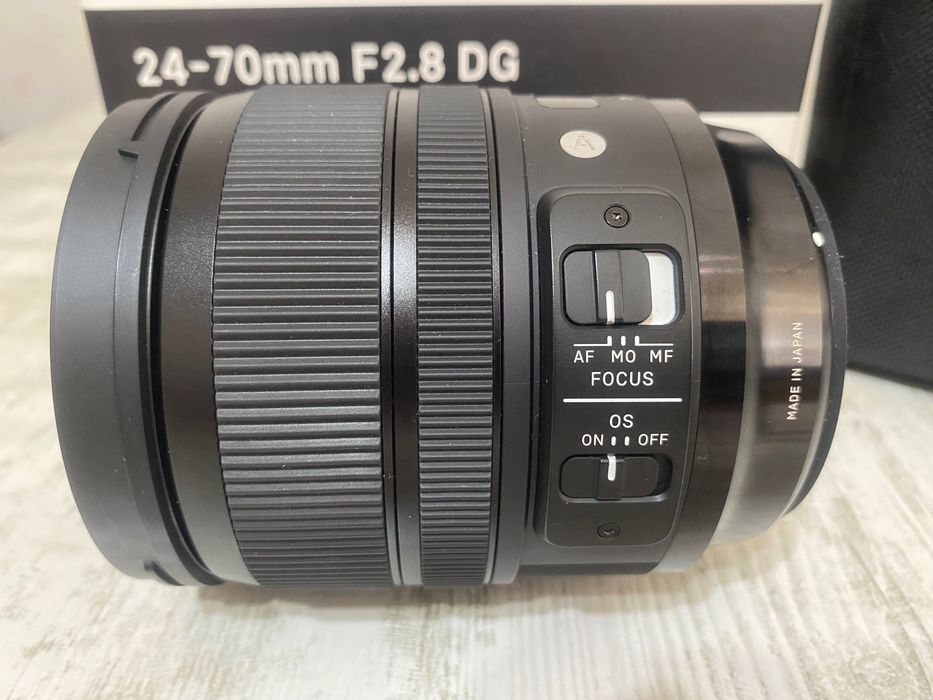 Vând obiectiv Sigma 24–70mm f/2.8 DG Art, montura EF, în garanție