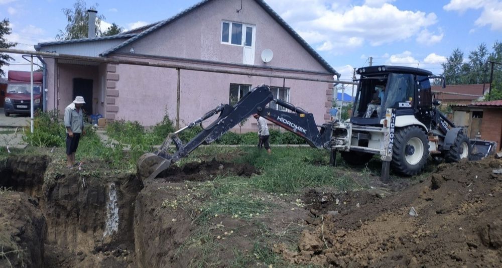 Услуги экскаватора погрузчика