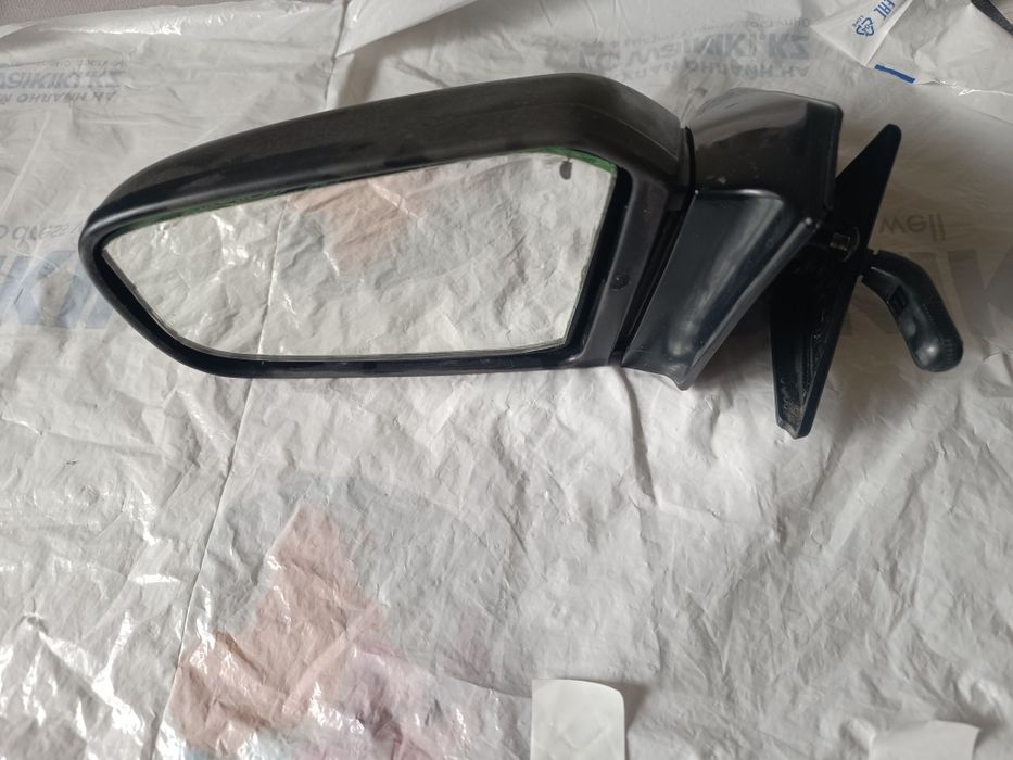 Боковое левое зеркало Mazda 323