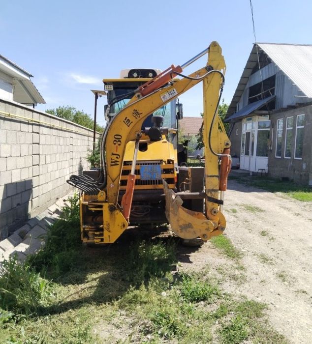 Продам экскаватор погрузчик