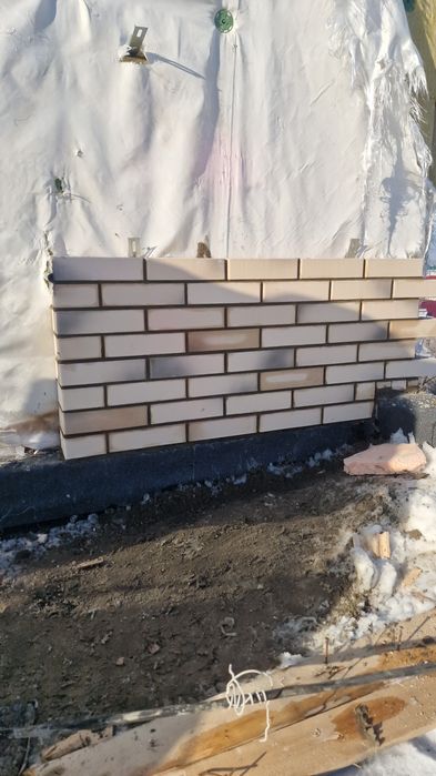 Каменщик с большим опытом