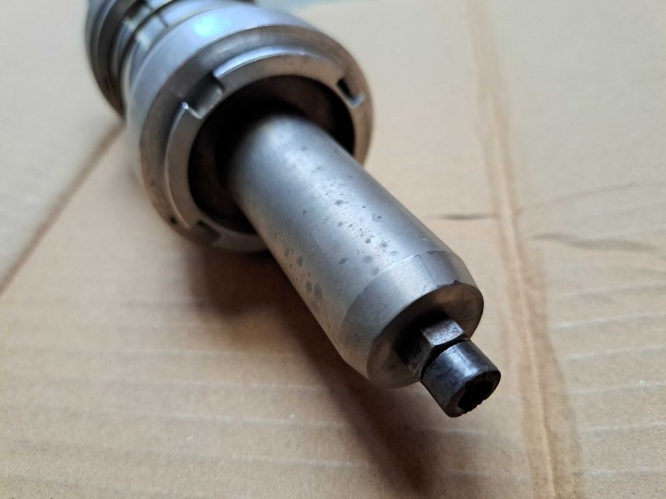 Adaptor pentru mașini CNC