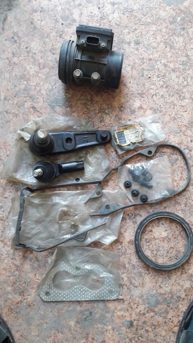 Запчасти на Мазду 323