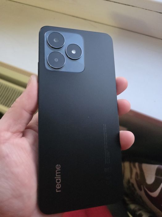 Vand Telefon Realme C53