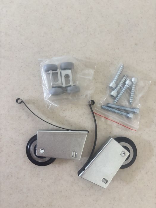 Ролики для дверей купе. Китай.