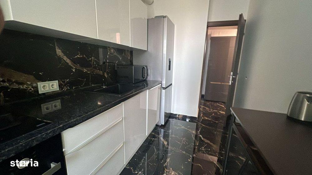 Asmita Gardens , vand ap.2 camere 2 bai, renovat, mobilat si utilat.
