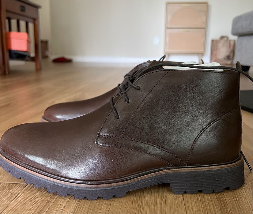 Новые кожаные ботинки