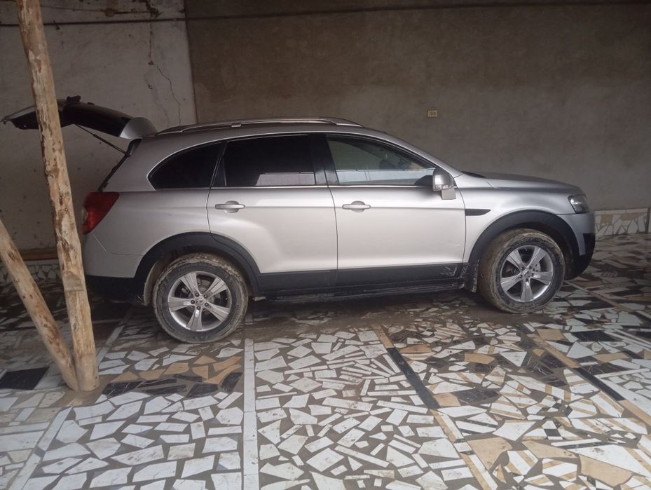 Каптива двигатель 2.4 сотилади