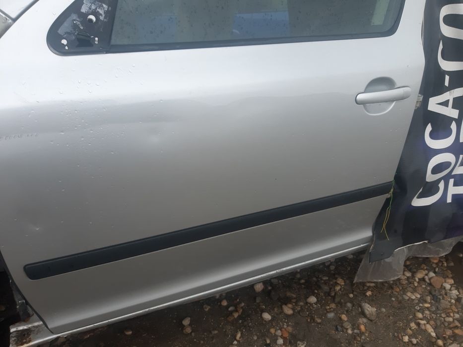 Usa stanga fara skoda octavia 2