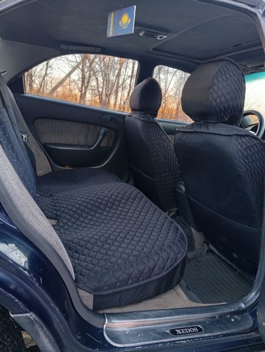 Мазда кседос 6 .