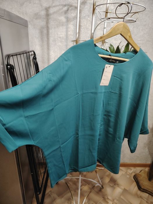 Костюмы новые 54-56-58