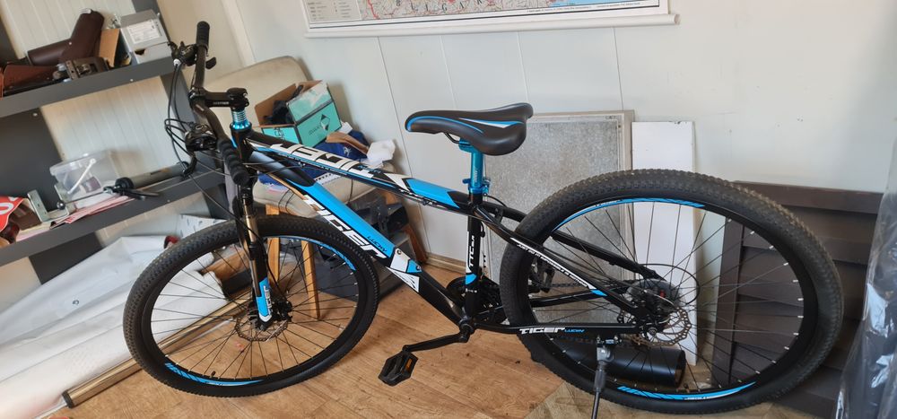 Bicicletă Tiger cadru aluminiu tare impecabilă roți pe 29 frână disc față spate impecabilă
