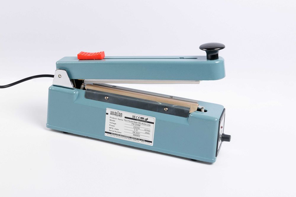 FS-200M Ручной импульсный запайщик с центральным ножом (AL.корп.)