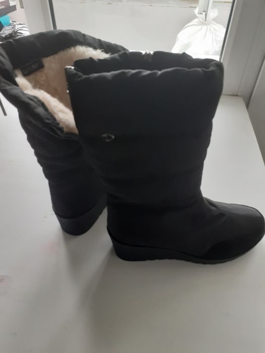 Продам сапоги новые