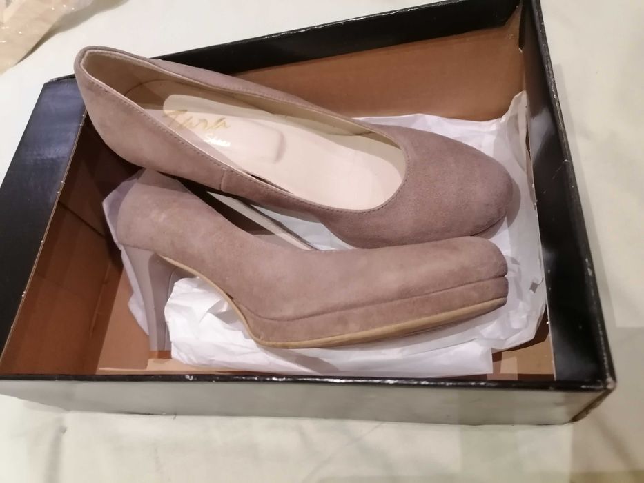 Елегантни естествена кожа практически нови