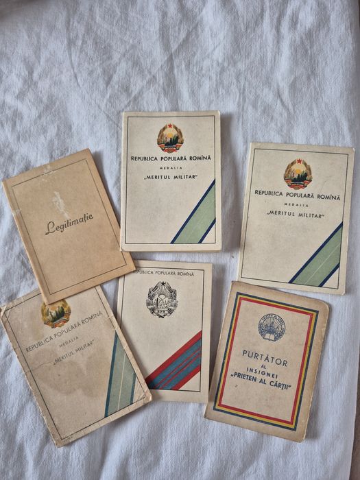 Vând brevete,legitimații,medalii vechi