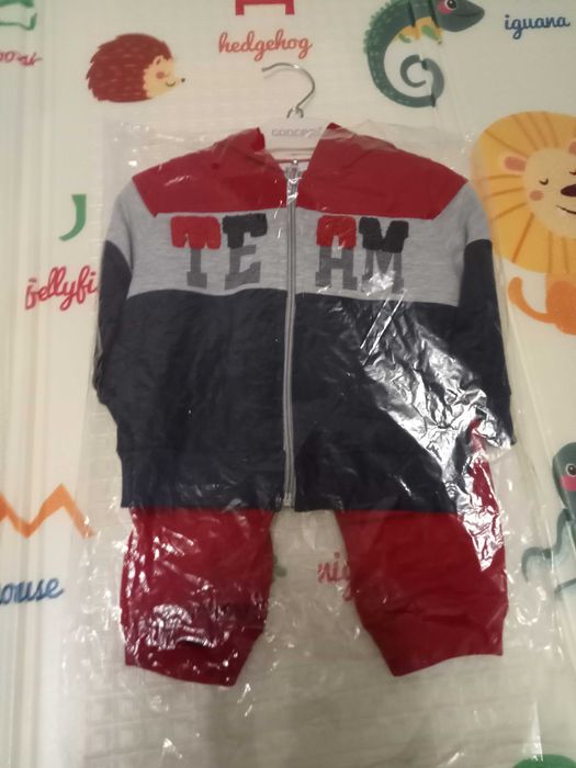 Новые детские одежды и обувь