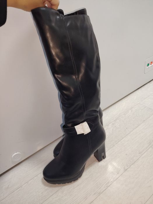 Продам новые сапоги