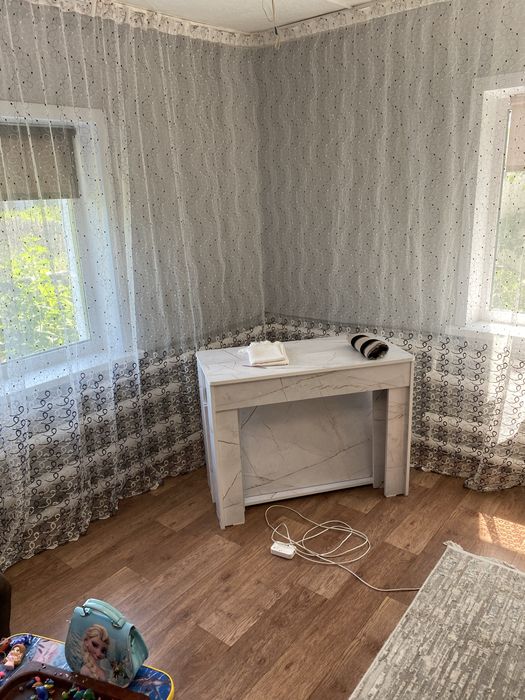 Четырехкомнатный дом в черте города