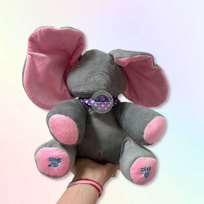 Плюшена играчка Слонче Куку-Бау 33 x 16 см, Пее и Играе, С Ушички за Покриване на Лицето