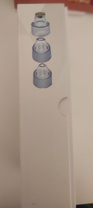 Уред за премахване на черни точки и масаж на лице