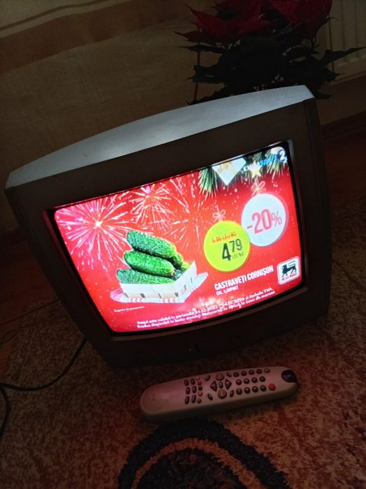Vând Televizor Orion cu telecomanda 38 cm.