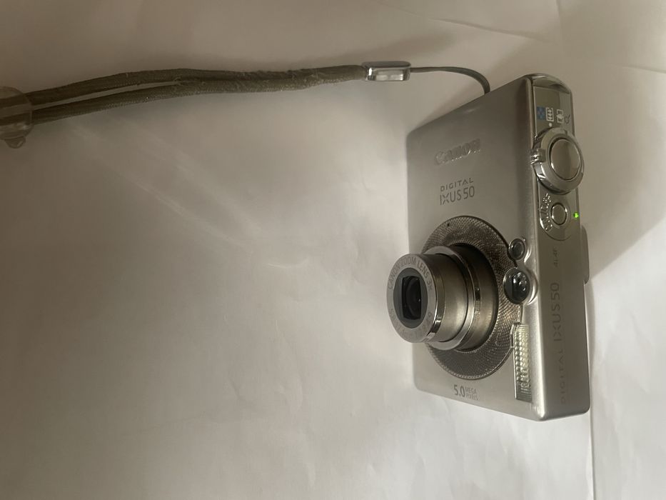 Canon Ixus 50 ,metal , made in Japan, afisaj data ora pe poze