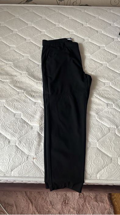 продам  черные брюки школьные