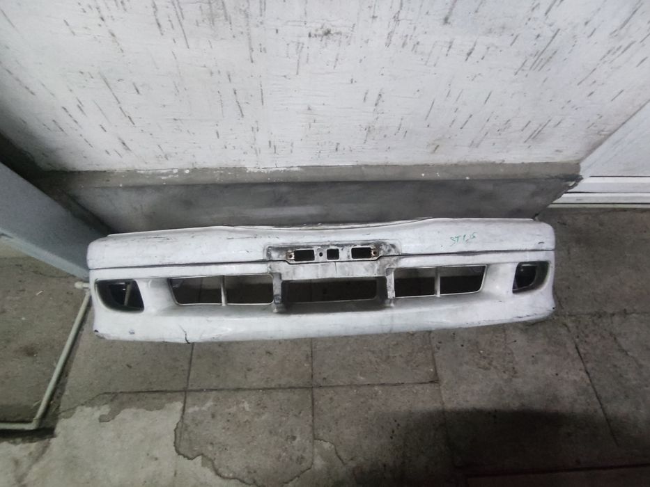Бампер Toyota caldina