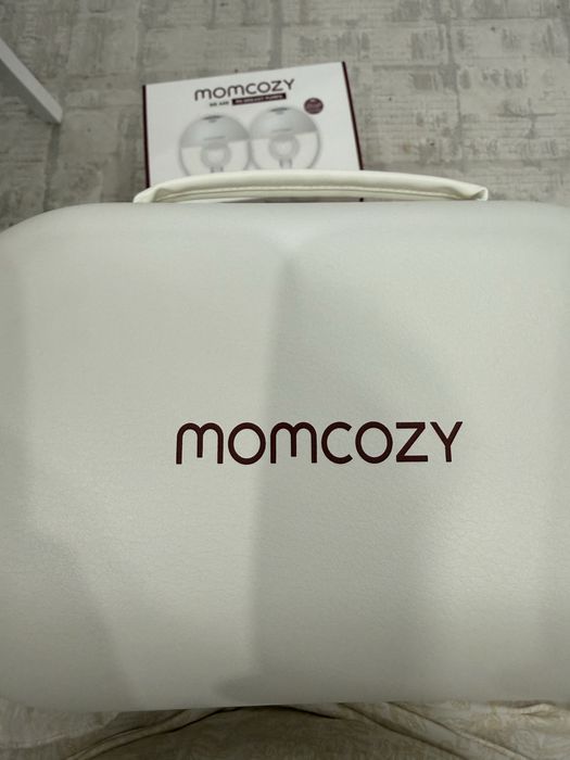 Продам автоматический молокоотсос Momcozy