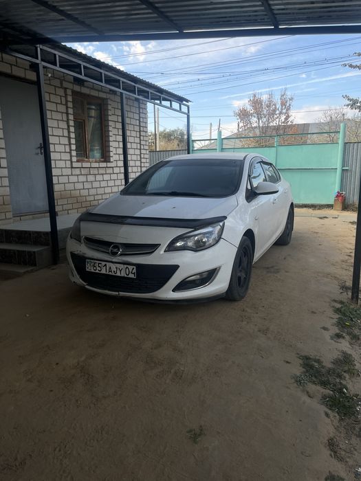 Opel ASTRA J 13 года