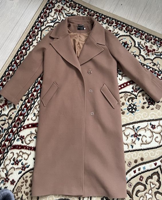 Продам пальто новое