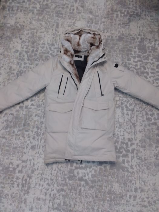 Продам зимние куртку на пуху
