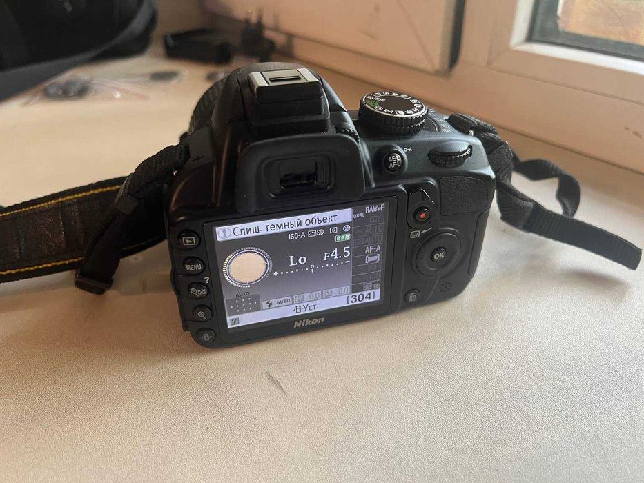 Nikon D3100 + 18-55mm