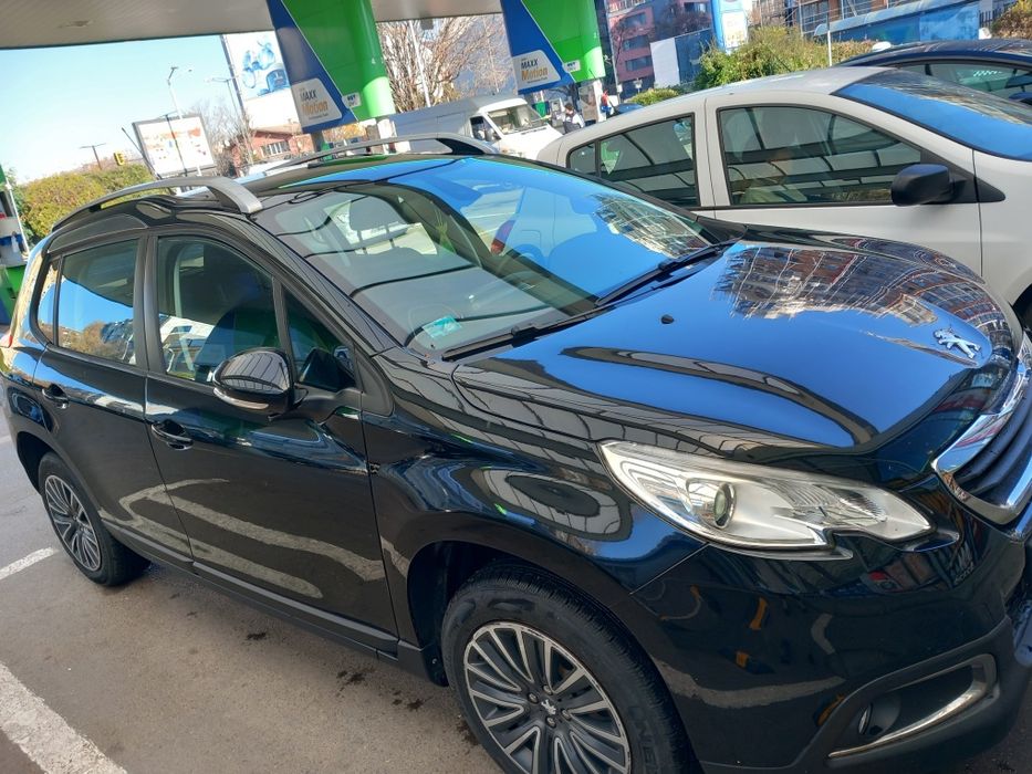 Лек автомобил Peugeot 2008,аутлендър,1.2 бензин 82 к.с.реални 23 640км