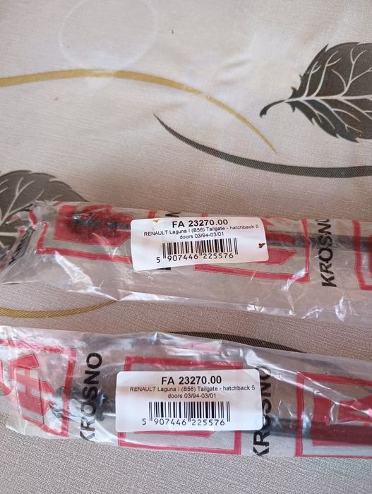 Амортисьори за багажник на Reno Laguna