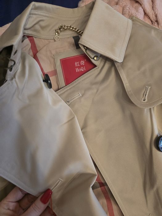 Продам тренч новый..