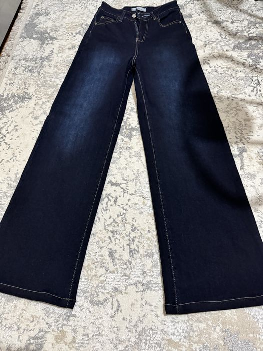 Продается женский джинсы