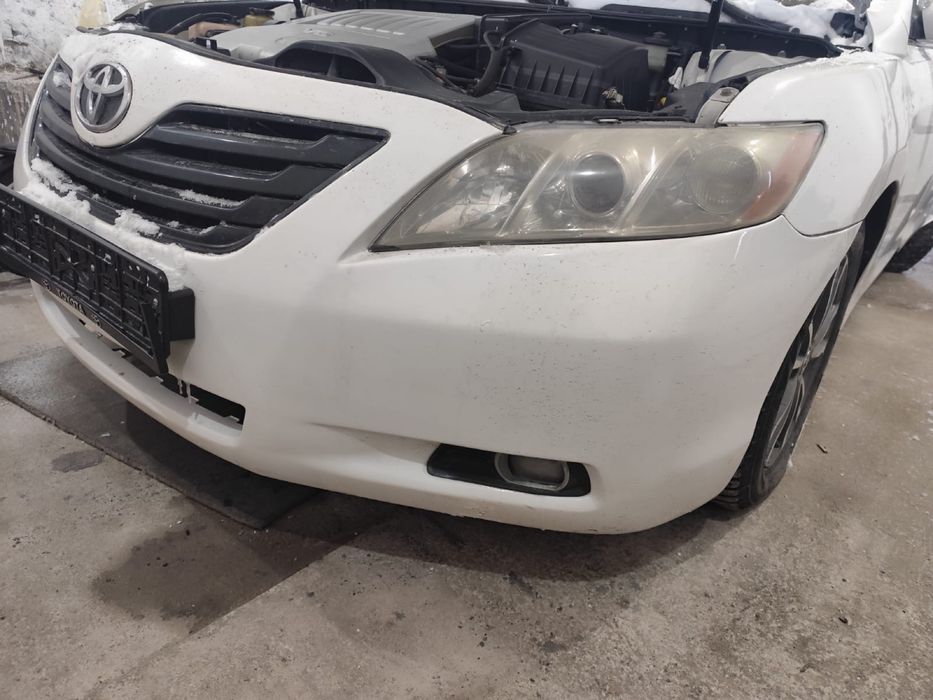 Бампер передний тайота камри 40