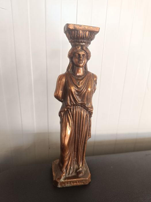 Бронзова статуя (Кариатида)Kapyatie Caryatid