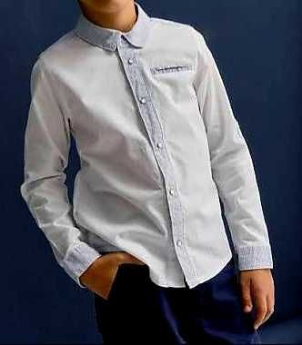 Детские вещи - рубашки, брюки.