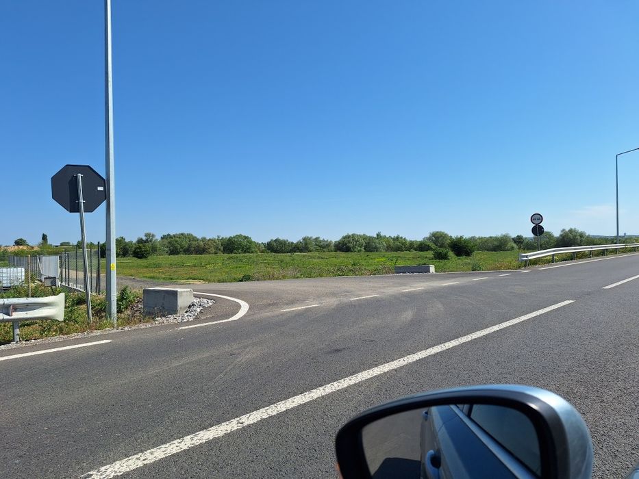 Teren intravilan industrial 8.717 mp cu front la centura noua