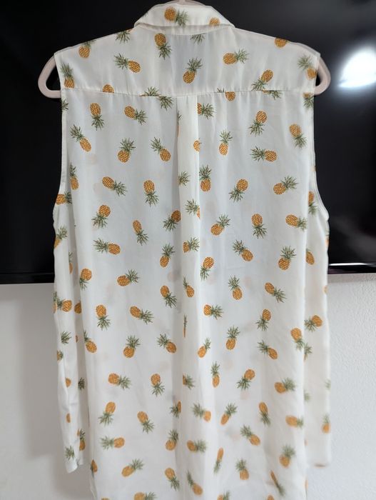 Cămașa fără mâneci dama