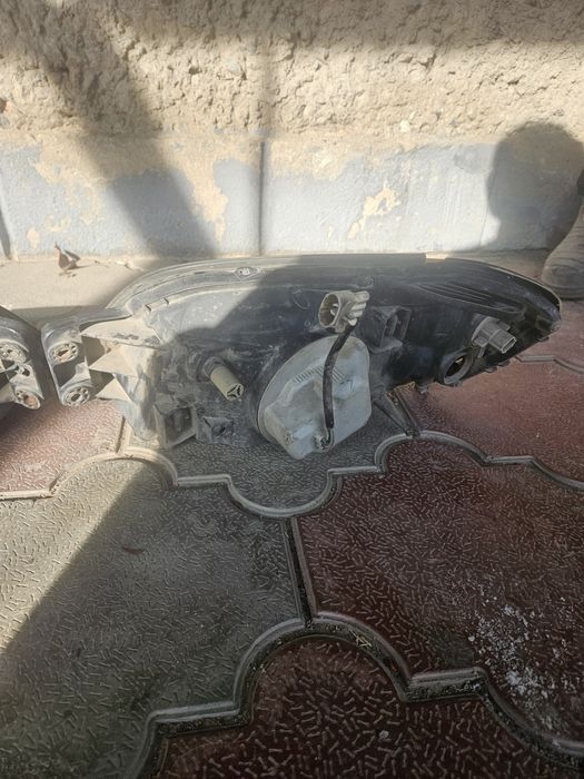 Фары на Subaru Outback B4